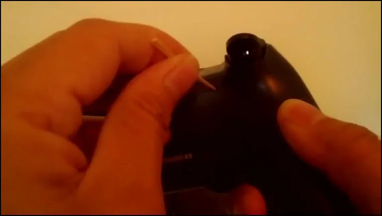 reset ps4 controller Reset PS4 Controller with a sharp object