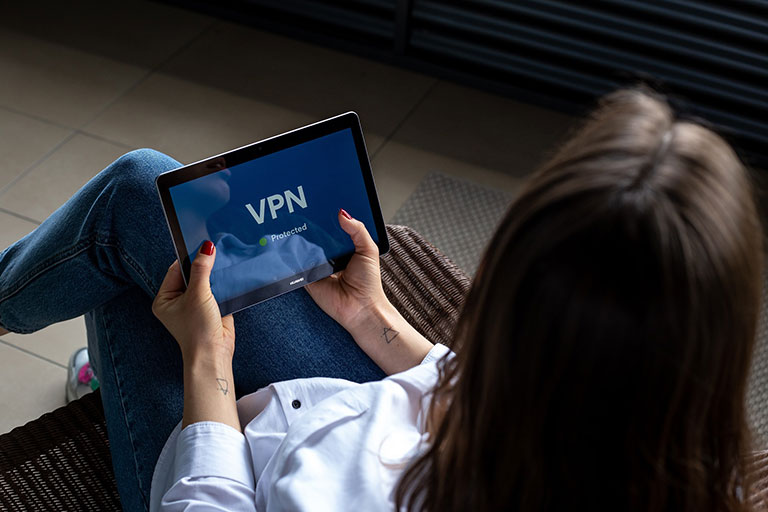 Holding Tablet With Vpn