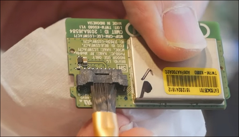 Use A Clean Soft Brush And Clean The Connection Slot Of The Wi-Fi Module