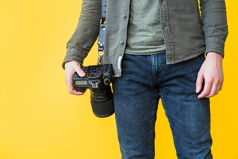 Holding Camera With Strap