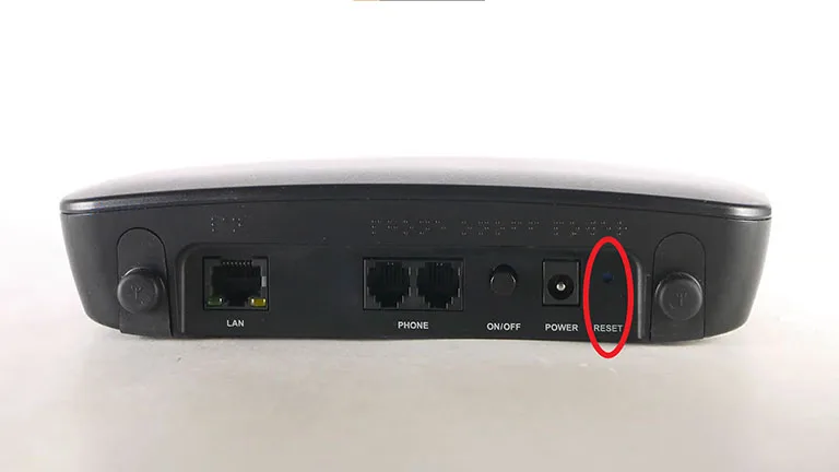Use a Safety Pin or Needle to Press and Hold the Reset Button of Router Use a Safety Pin or Needle to Press and Hold the Reset Button of Router